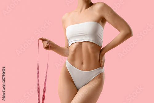 Young woman in underwear wi...