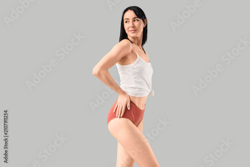 Young woman in red menstrua...