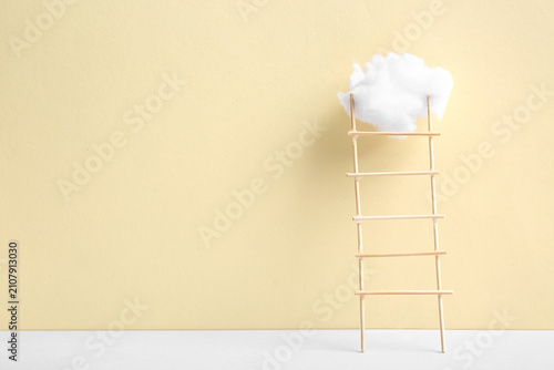 Ladder with cotton cloud on...