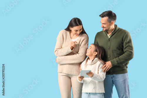 Happy family and their daug...