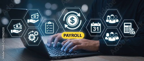 Conceptual image of payroll management using technology showcasing financial data and employee information on a laptop for modern business solutions and efficiency.