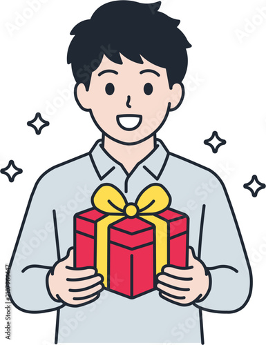 Cheerful young man in a grey shirt holding a red gift box with a yellow bow.