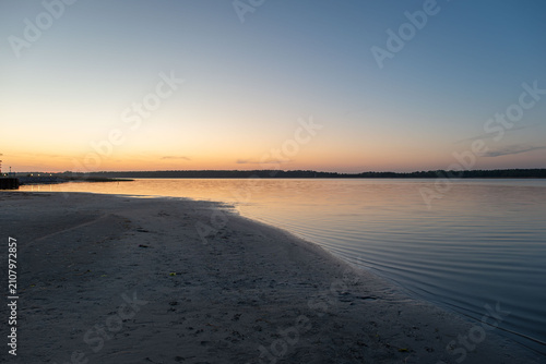 The beach in Barhöft is a small swimming area about 60 meters wide, located directly on the Grabow River along the Bodden coast, featuring fine sand and gentle access to the water