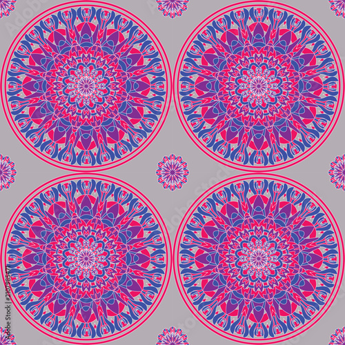Elegant circular mandala seamless pattern featuring pink and blue layered petals on a soft gray background. Ideal for textiles, wallpaper, upholstery, packaging, stationery, and home décor.