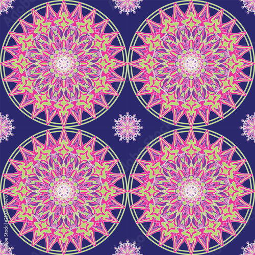 Vibrant floral mandala seamless pattern with neon pink and lime geometric petals on a deep blue background. Perfect for fabric, wallpaper, wrapping paper, textiles, home décor, and digital prints.