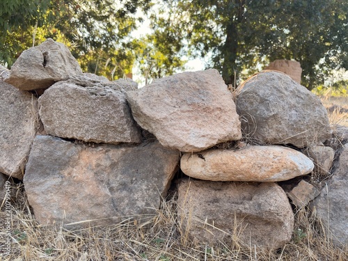 Photography Dry stone boundary wall at the reconstructed prehistoric settlement of Lemba-Lak