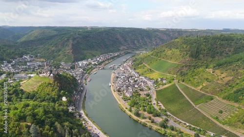 Moselle valley, aerial view over Cochem, steep lush  vineyards, mosel river and castle on hilltop, rhineland palatinate in Germany