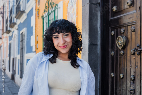 young latina woman smiling outdoors in Mexico Latin America, hispanic and mexican female portrait