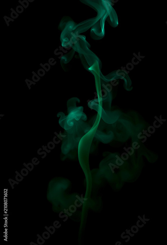 Green smoke rising and swir...