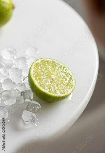 Fresh lime half with ice cu...