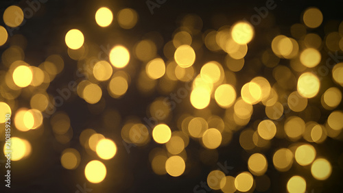 Warm Golden Bokeh Lights Background Texture.