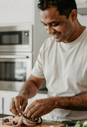 Smiling man preparing fresh...