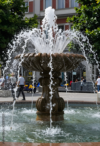 Ornate bronze fountain with...