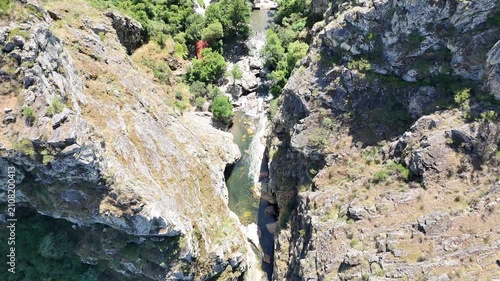 Top-Down Drone Flight Over a Canyon and Mountain River in Portugal
