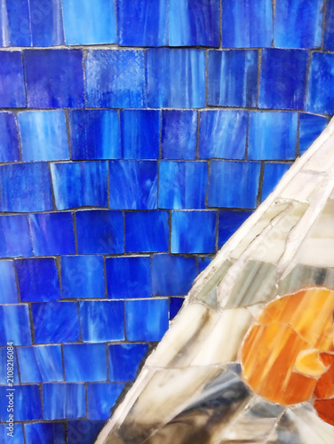 Close-up of a colorful mosaic made of ceramic fragments. Abstract texture, decorative art, handmade craftsmanship, detailed mosaic pattern.