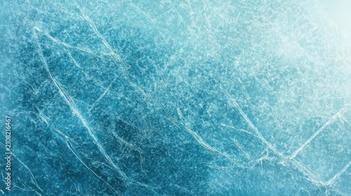 Close-up image of cracked ice with intricate patterns and textures in shades of blue and white.