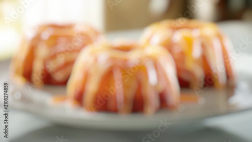 A simple and delicious-looking cake on a white plate, perfect for graphy or food styling