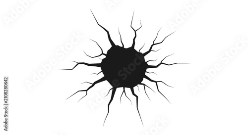 Фотография Cracked surface with radiating fractures a dark silhouette against a white backg