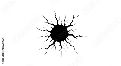 фотографія Cracked surface with radiating fissures a black and white silhouette crack fissu