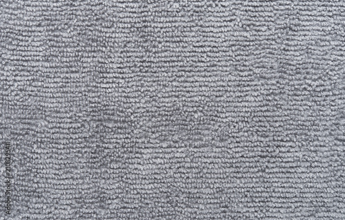 Foto Grey towel texture close up, top view
