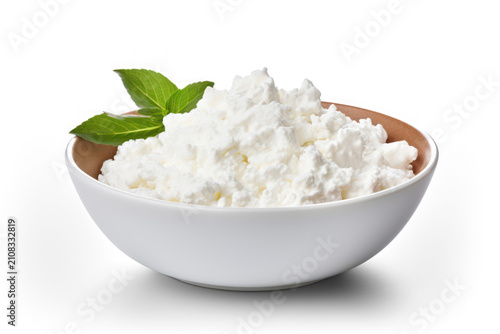 Cottage cheese in white bowl with green mint isolated on transparent background, png file