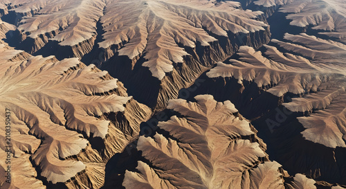 Aerial View of Majestic Canyon Formations and Deep Ravines in Arid Desert Landscape for Environmental and Travel Media Backgrounds