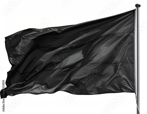 A solid black flag waves gently from a metallic pole against a white backdrop