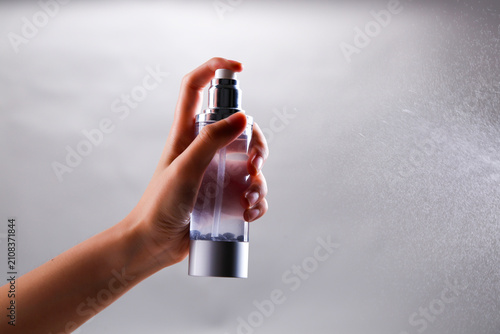 Spray water with a spray bottle