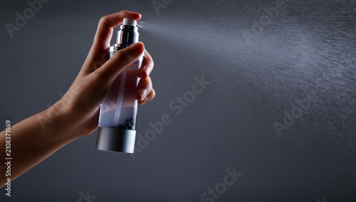 Bild auf Leinwand Spray water with a spray bottle