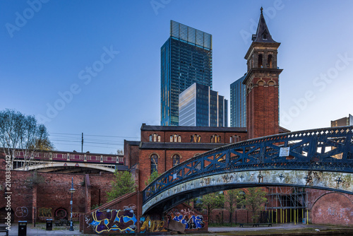 Slika na platnu Footbridge over the Bridgewater Canal at Castlefield Basin in Manchester, Uk