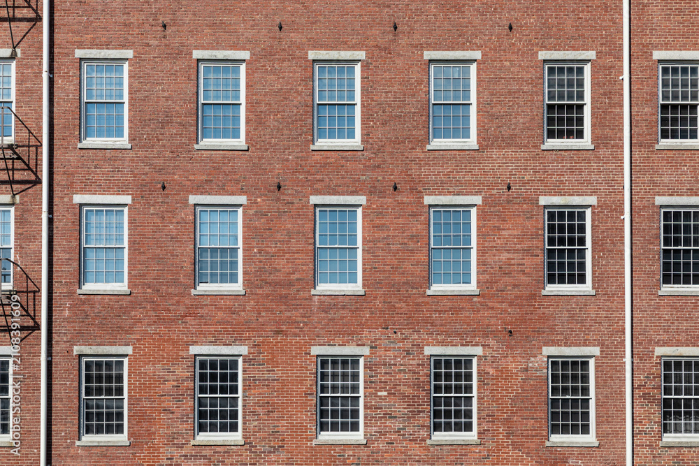 Fototapeta premium brick facade of the industry museum Boott cotton mills in Lowell, USA