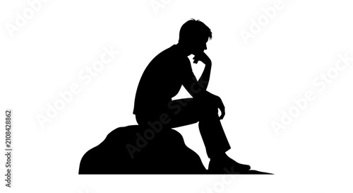 Fotografía Silhouette of a Thoughtful Person Sitting on a Rock.