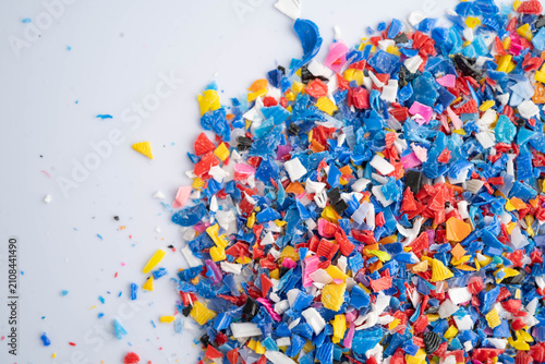 Картината върху платно Plastic colorful pieces recycling shredded for industrial use.