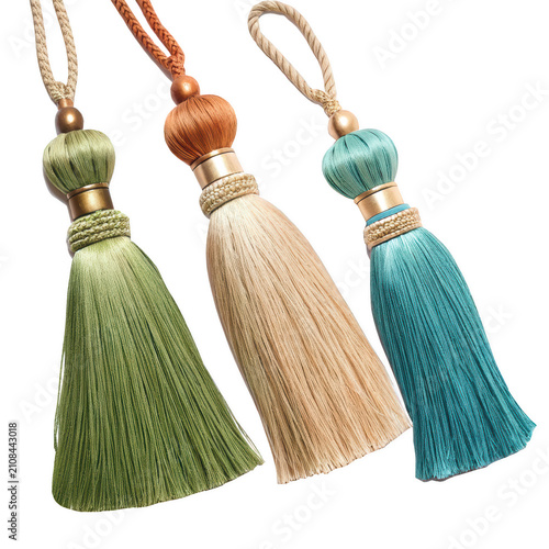 Three silk tassel door hangers in green beige and blue isolated on transparent background isolated on a transparent background