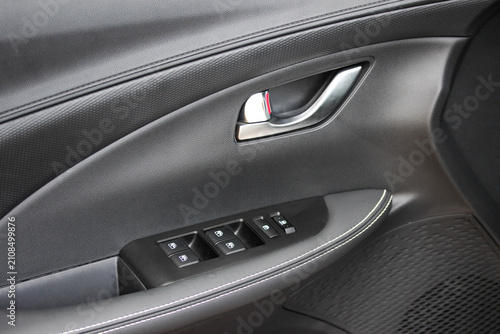 New vehicle driver door card with power window and mirror controls