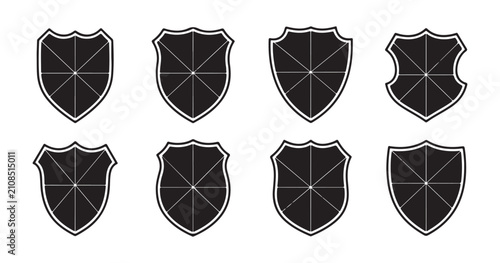 Foto Shield emblems with radial division lines showcasing intricate geometric patterns