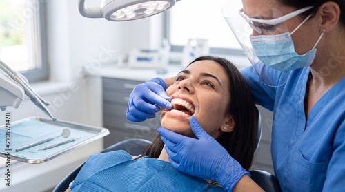A female dentist wearing a mask and face shield performing a dental examination on a ad social media download thambnail poster web template event festival 2026 2027 2028