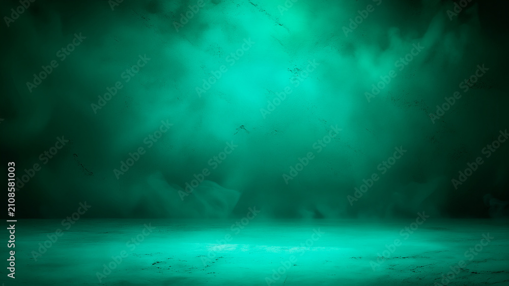 Obraz premium A premium emerald green studio background featuring a smooth, moody gradient texture with soft atmospheric smoke effects, perfect for modern product displays, professional photography backdrops,