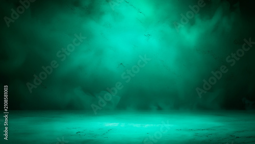 A premium emerald green studio background featuring a smooth, moody gradient texture with soft atmospheric smoke effects, perfect for modern product displays, professional photography backdrops,