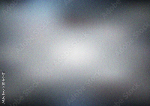 Mystical dark grey and deep blue gradient showcasing a luminous bright center with a textured overlay