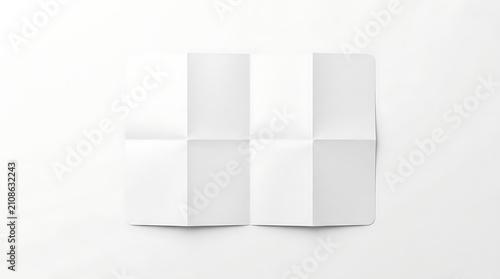Top Down View of Blank White Folded Paper Document on White Background with Soft Shadows and Clean Minimalist Aesthetic