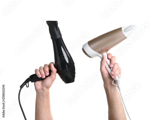 Plakat w ramie Professional hairdresser with hair dryers on white background, closeup