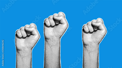 Schilderij op canvas Three halftone raised fists on blue background
