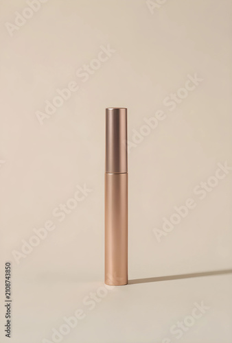 Rose gold mascara tube with...