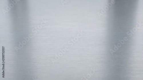 Brushed silver metallic texture seamless background. Industrial reflective surface for modern design and tech products.