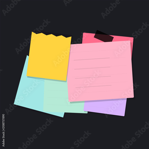 Colorful stack of sticky notes and notepads on dark background