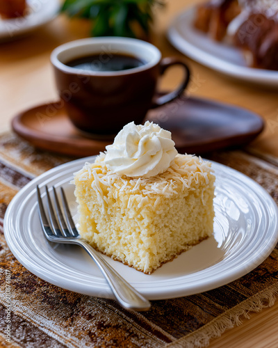 Brazilian Bombocado Coconut Cake Slice with Whipped Cream and Espresso
