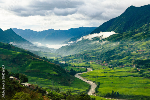 River Winding Through Terraced Rice Paddies in Muong Hoa Valley Sapa