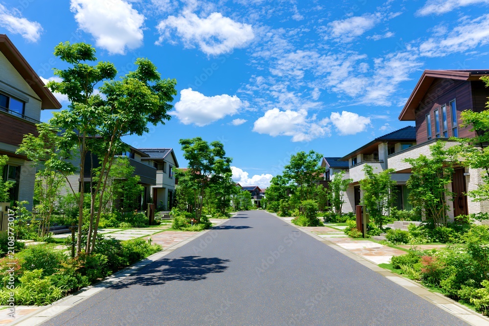 Obraz premium 青空の下に広がる新しい住宅街の風景安心の生活