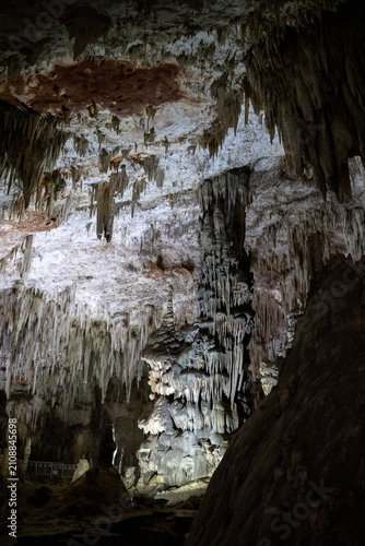 Dazzling Brilliant White Stalactite Formations Under Bright Spotlights in Les Grottes des Beni Add Algeria
